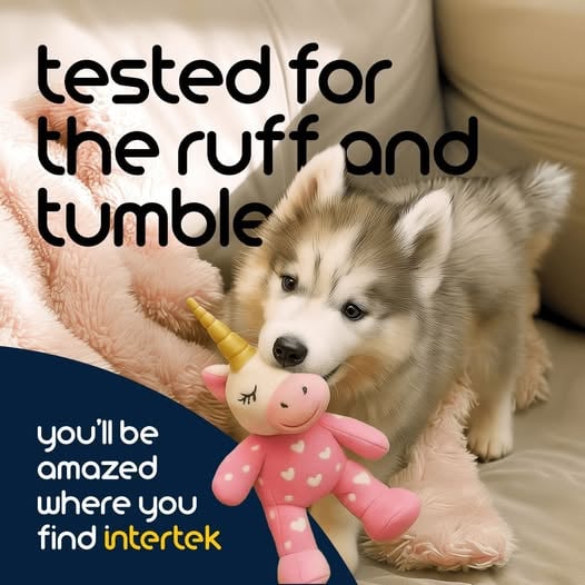 Puppy holding a chew toy in its mouth